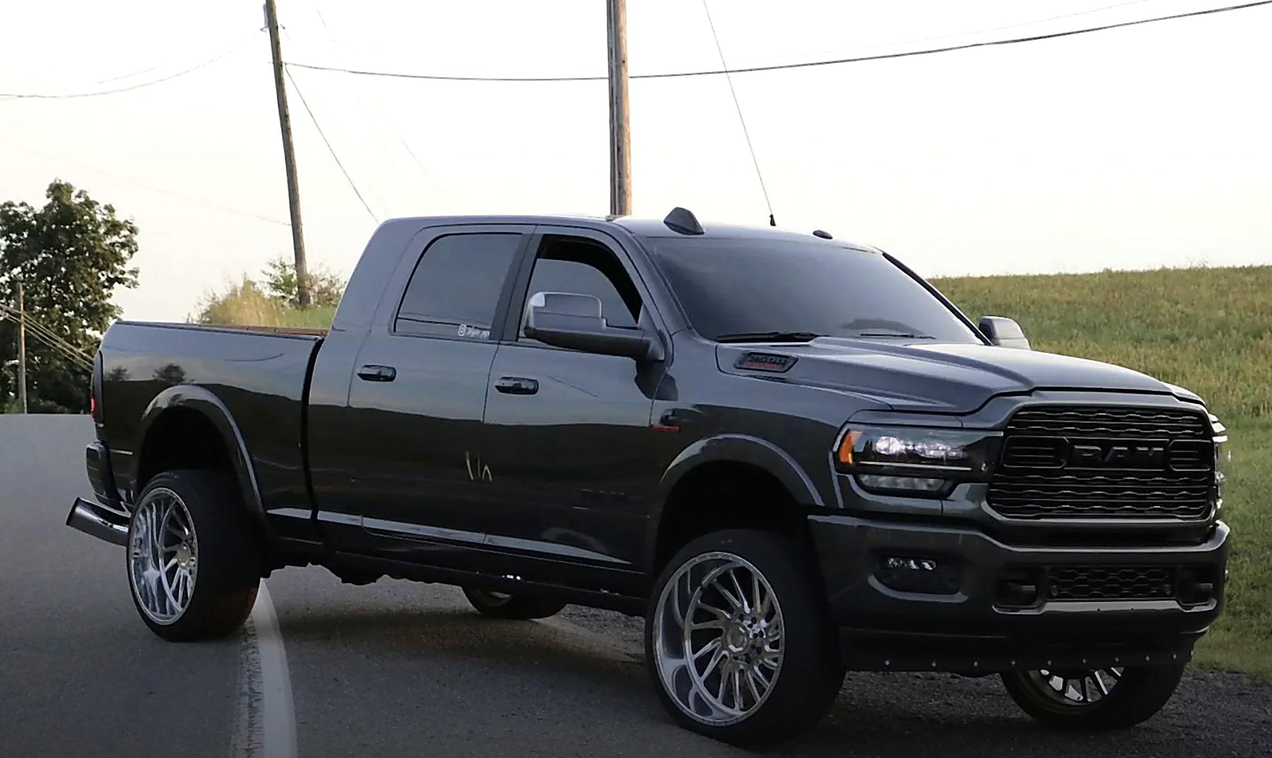 Overkill-calibrated 6.7L Cummins shop truck at night
